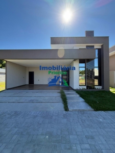 CASA COM 3 SUÍTES EM CONDOMÍNIO PRÓXIMO...